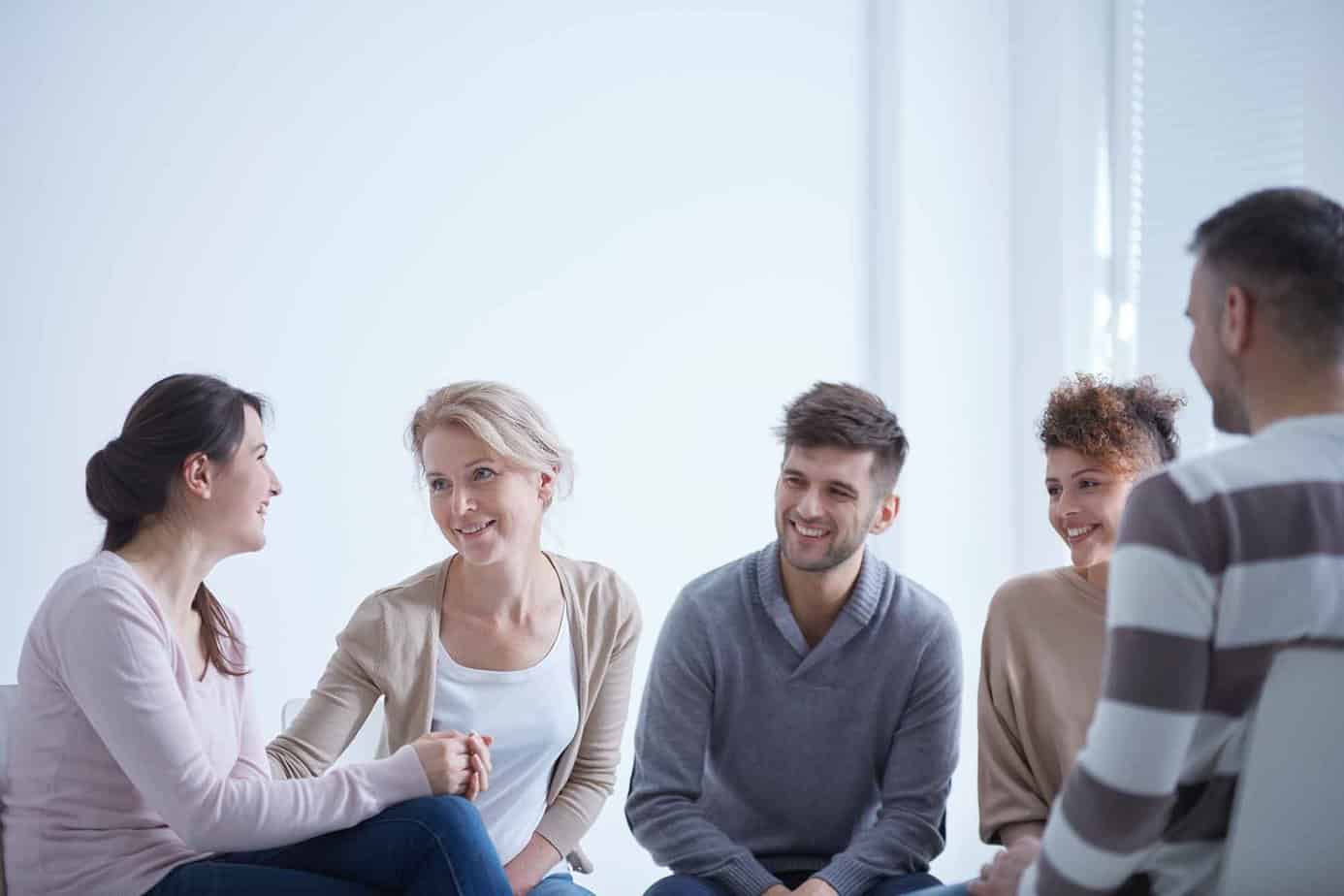 4 young adults in peer support group for addiction treatment at Mountainside Treatment Center