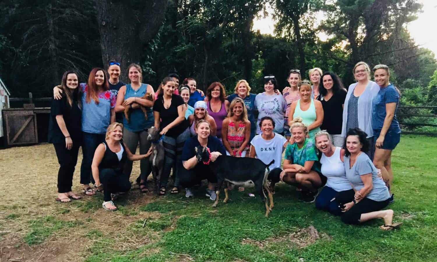 Group photo at Mountainside Treatment Center Alumni Goat Yoga Therapy in Canaan