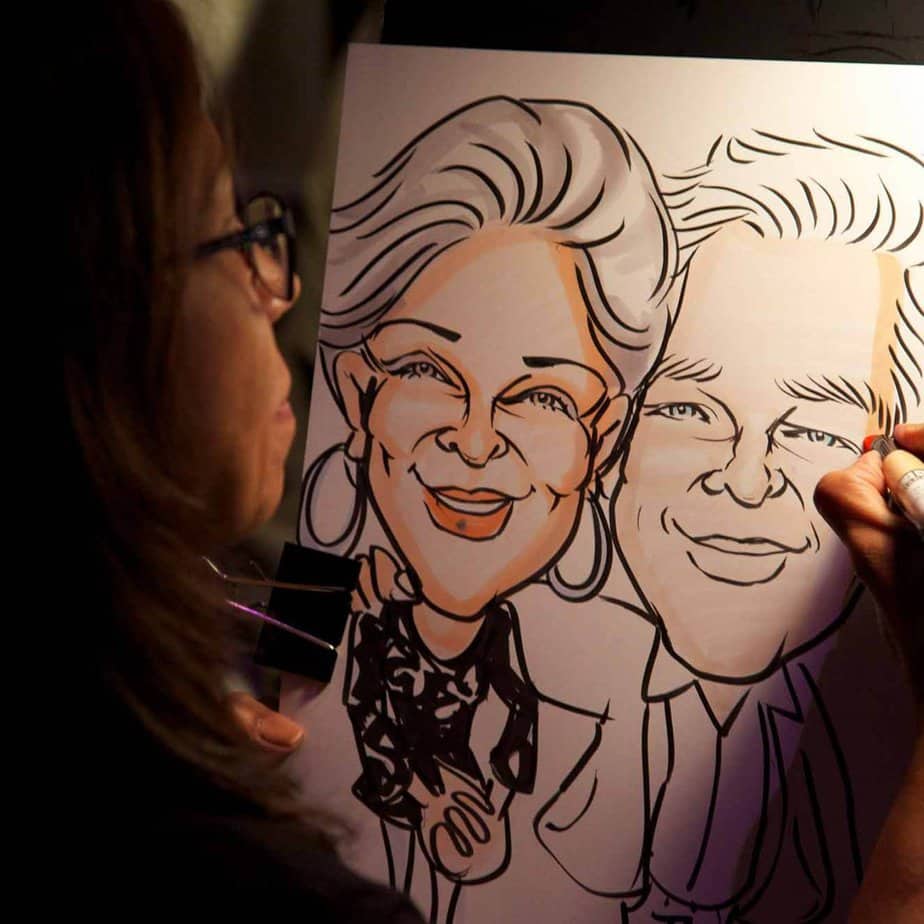 Caricature of couple at Mountainside Treatment Center Alumni Jazz on the Hudson Event in NYC