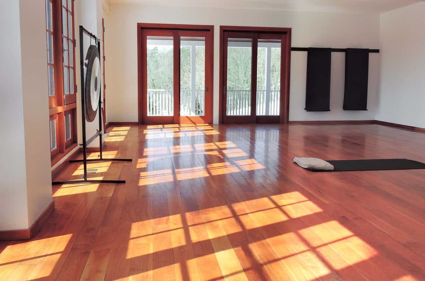 Large meditation and yoga studio with lots of natural light at Mountainside sober living house