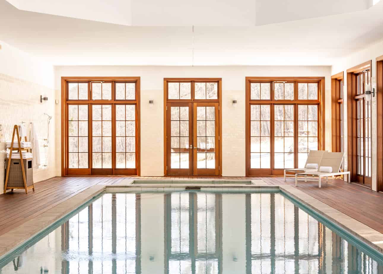 Large indoor pool with lots of natural light at men's extended care sober living house in Connecticut.