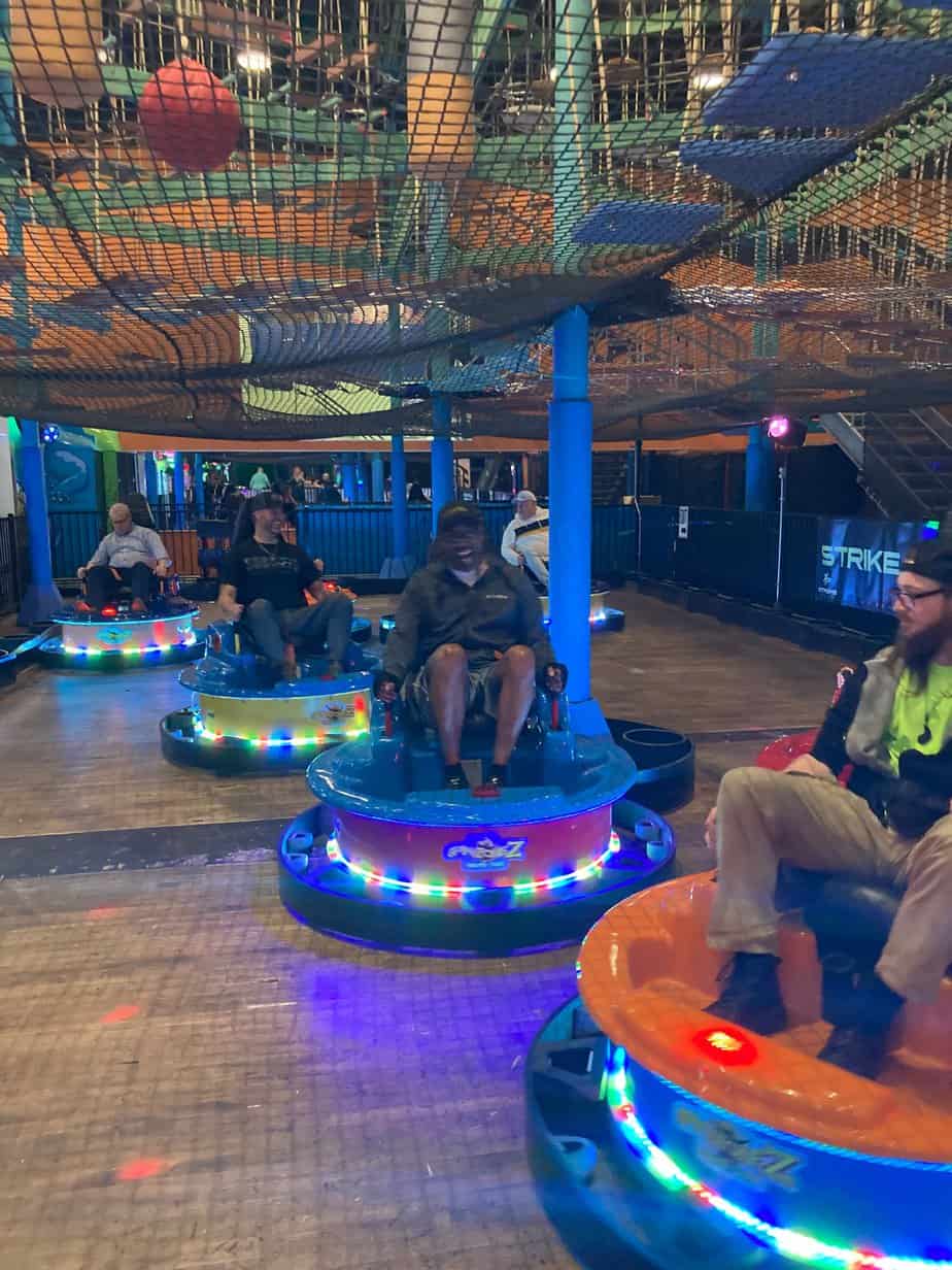 Mountainside Treatment Center Alumni riding on bumper cars at Xtreme Play 2022 in Danbury