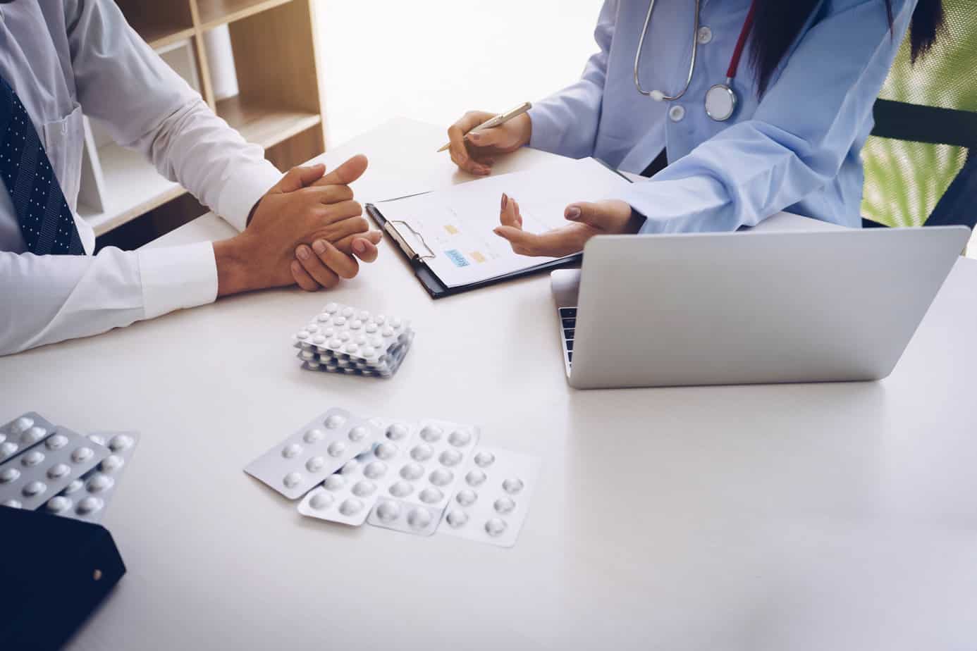 doctor prescribing medication to client